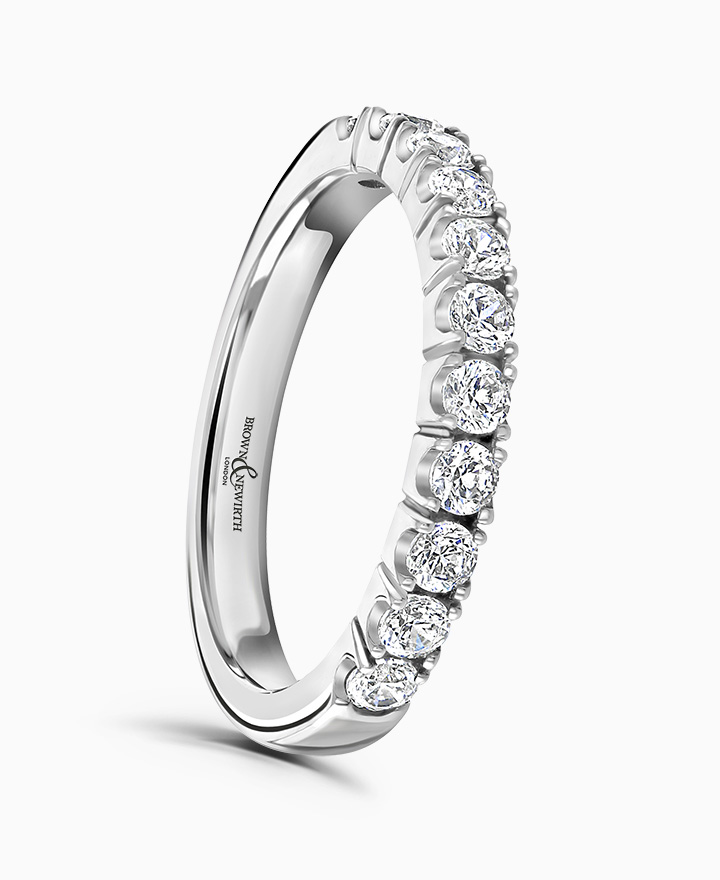 Claw set diamond eternity ring