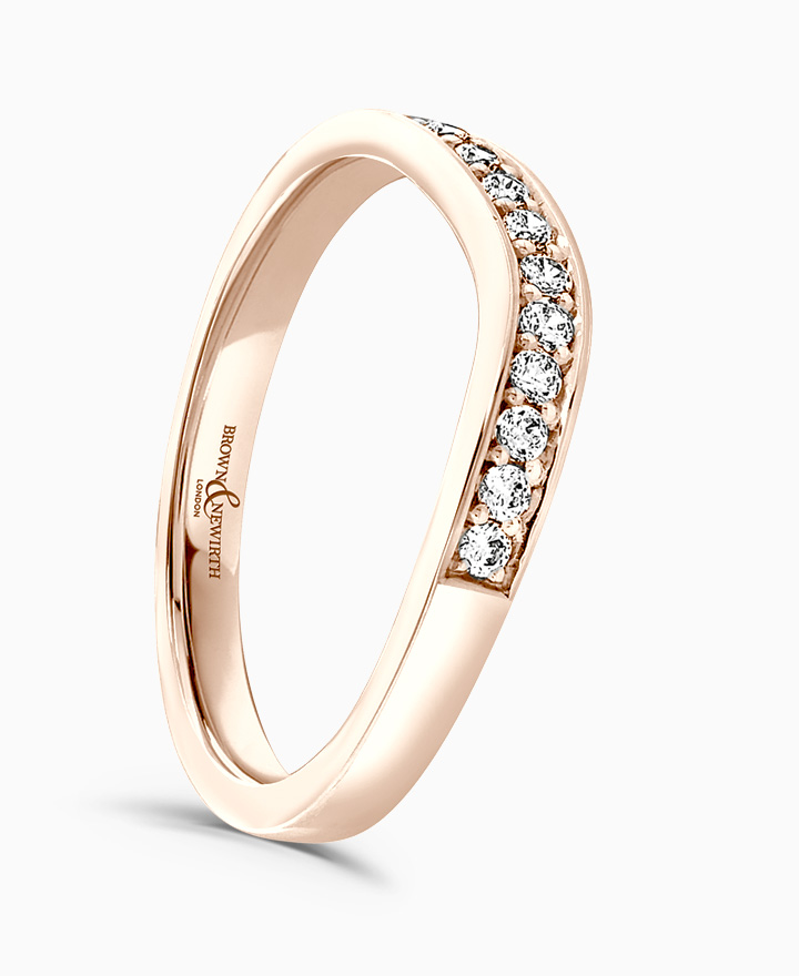Curved diamond wedding ring